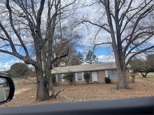 view of front of home featuring metal roof