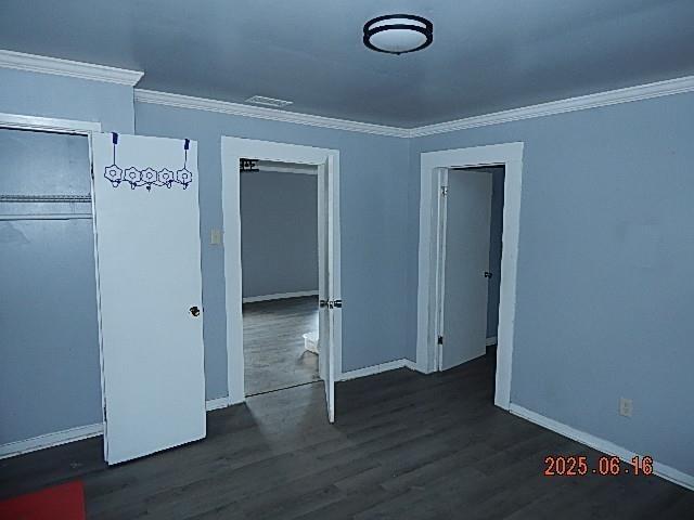 1021 Cherry St, Mobile, AL 36610 - unfurnished bedroom with ornamental molding and wood finished floors