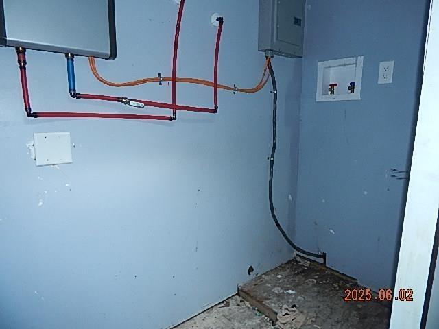 1021 Cherry St, Mobile, AL 36610 - laundry room with electric panel and washer hookup