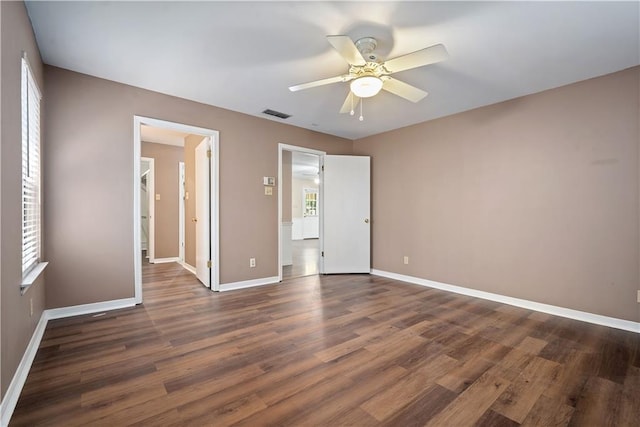 5902 Reams Dr S, Mobile, AL 36608 - unfurnished bedroom with dark wood-style flooring and ceiling fan