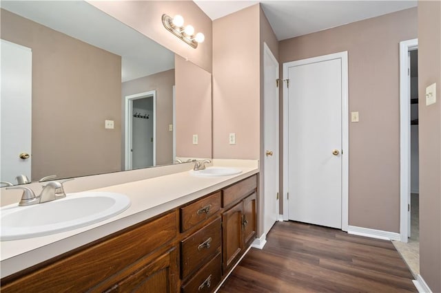 5902 Reams Dr S, Mobile, AL 36608 - bathroom with double vanity and wood finished floors