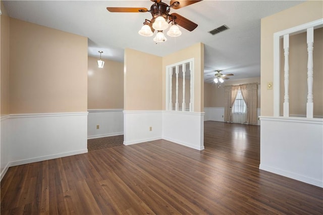 5902 Reams Dr S, Mobile, AL 36608 - empty room with a ceiling fan, wood finished floors, and wainscoting