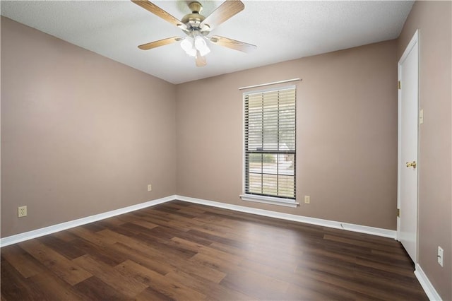 5902 Reams Dr S, Mobile, AL 36608 - empty room with dark wood finished floors, ceiling fan, and a textured ceiling
