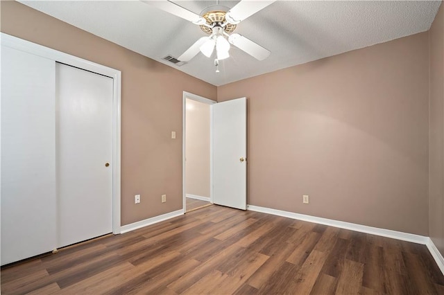 5902 Reams Dr S, Mobile, AL 36608 - unfurnished bedroom with wood finished floors, ceiling fan, and a closet