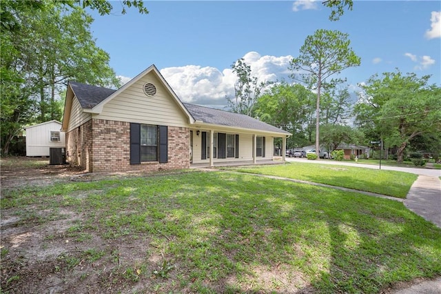 5902 Reams Dr S, Mobile, AL 36608 - ranch-style home featuring brick siding and a front yard