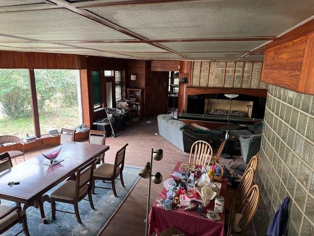 dining space with wooden walls