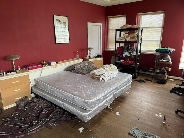 bedroom featuring hardwood / wood-style flooring