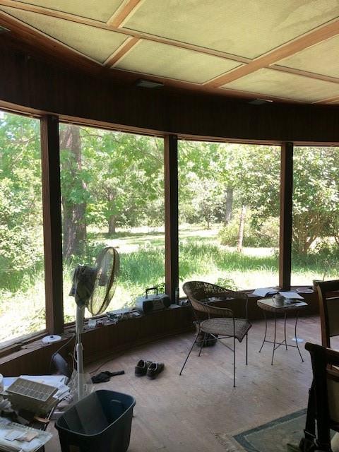 unfurnished sunroom with a healthy amount of sunlight