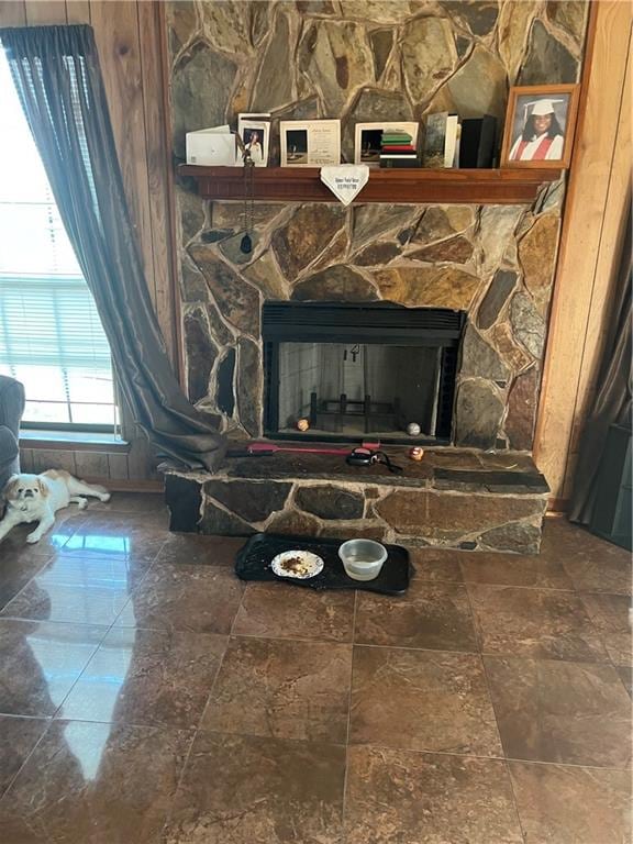 room details with tile flooring and a fireplace