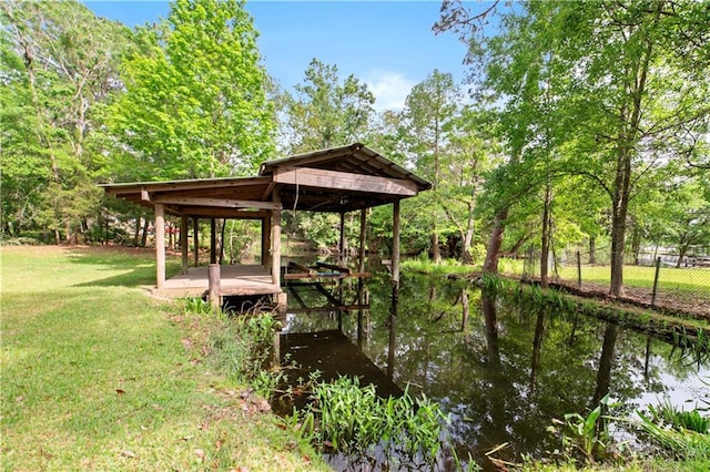 5039 Cole Dr W, Mobile, AL 36619 - view of dock featuring fence and a yard