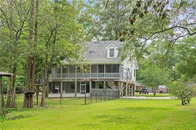 5039 Cole Dr W, Mobile, AL 36619 - rear view of property featuring a yard, fence private yard, a sunroom, and stairs