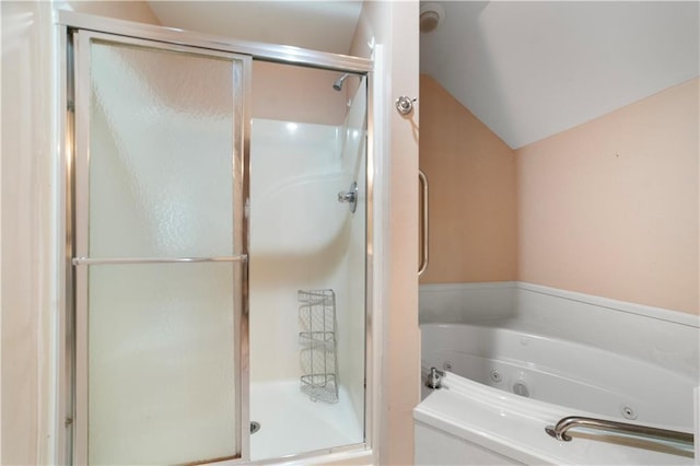 5039 Cole Dr W, Mobile, AL 36619 - full bath featuring vaulted ceiling, a whirlpool tub, and a stall shower