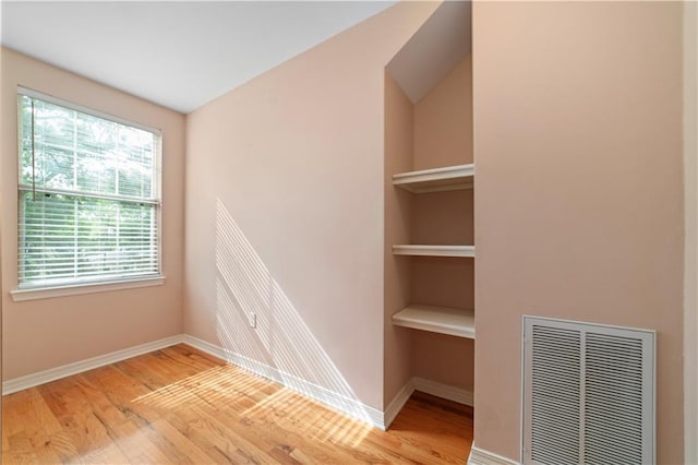 5039 Cole Dr W, Mobile, AL 36619 - interior space with baseboards, visible vents, built in shelves, and wood finished floors