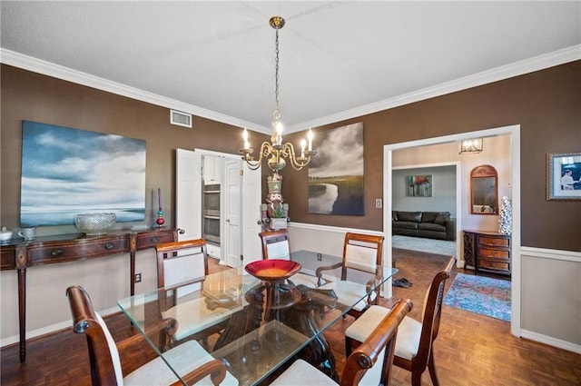 dining area featuring ornamental molding and parquet floors