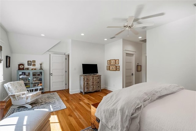 bedroom featuring ceiling fan and hardwood / wood-style flooring