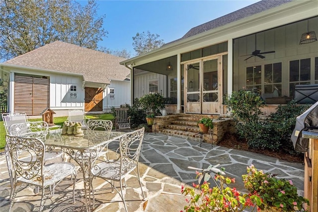 view of patio / terrace with a sunroom and ceiling fan