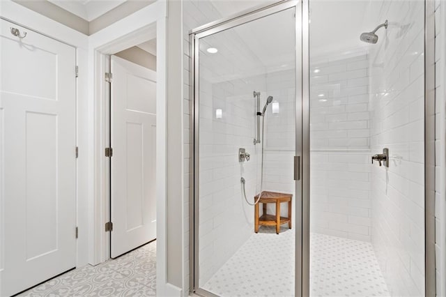 109 Quebec Ct, Dauphin Island, AL 36528 - bathroom featuring a stall shower and tile patterned flooring
