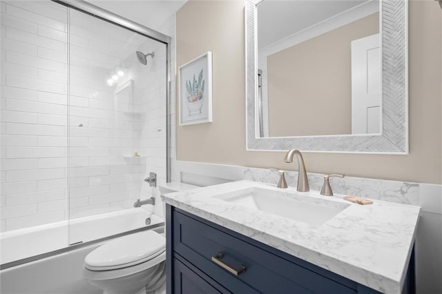 109 Quebec Ct, Dauphin Island, AL 36528 - bathroom with toilet, vanity, enclosed tub / shower combo, and crown molding