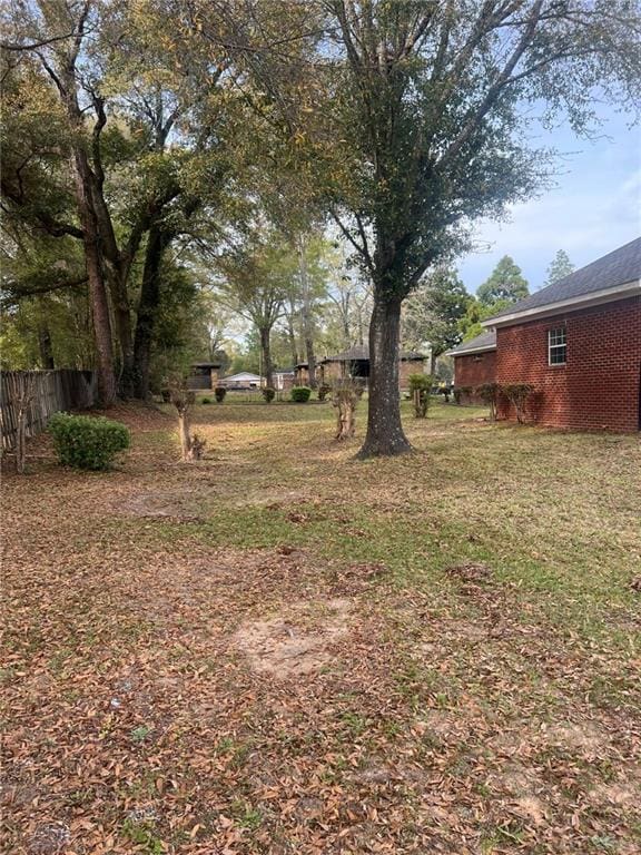 view of yard featuring fence