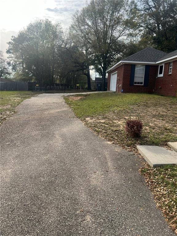 view of asphalt driveway