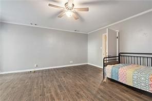 unfurnished bedroom with baseboards, crown molding, wood finished floors, and ceiling fan