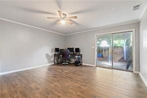 office featuring wood finished floors, crown molding, ceiling fan, and visible vents