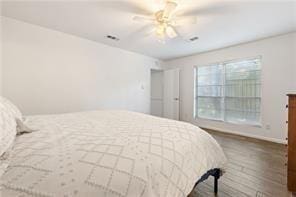 bedroom featuring ceiling fan