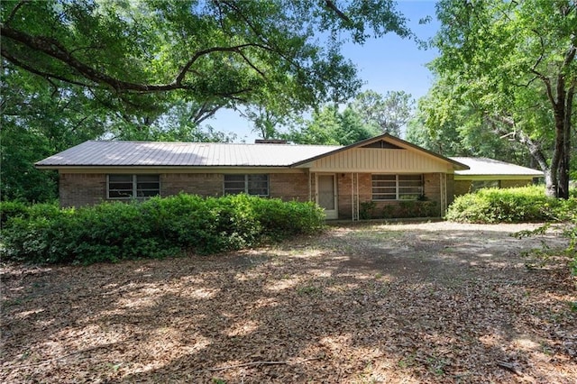 2950 Pinetucky Rd, Mobile, AL 36618 - ranch-style house featuring brick siding and metal roof