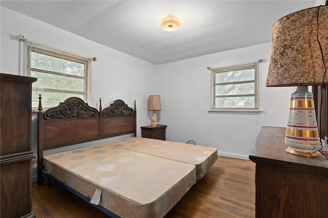 2950 Pinetucky Rd, Mobile, AL 36618 - bedroom with dark wood-style flooring and baseboards