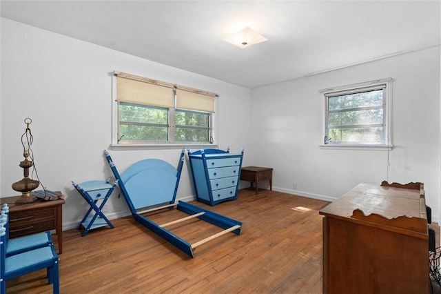2950 Pinetucky Rd, Mobile, AL 36618 - bedroom with hardwood / wood-style flooring, multiple windows, and baseboards