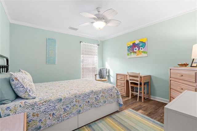 bedroom with baseboards, visible vents, ceiling fan, ornamental molding, and wood finished floors