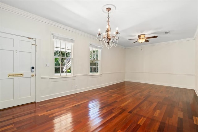 spare room featuring ceiling fan with notable chandelier, ornamental molding, and dark wood-type flooring