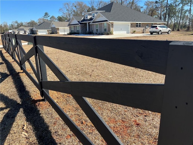 view of yard with fence and a residential view