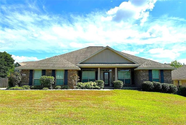 ranch-style house with a front lawn