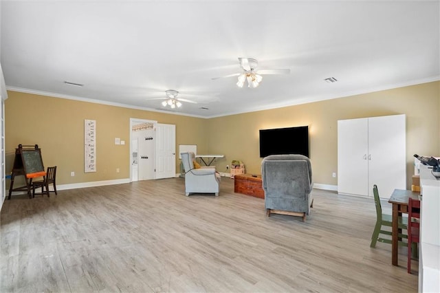 704 Providence Estates Dr E, Mobile, AL 36695 - living area with ornamental molding, a ceiling fan, light wood-style floors, and baseboards
