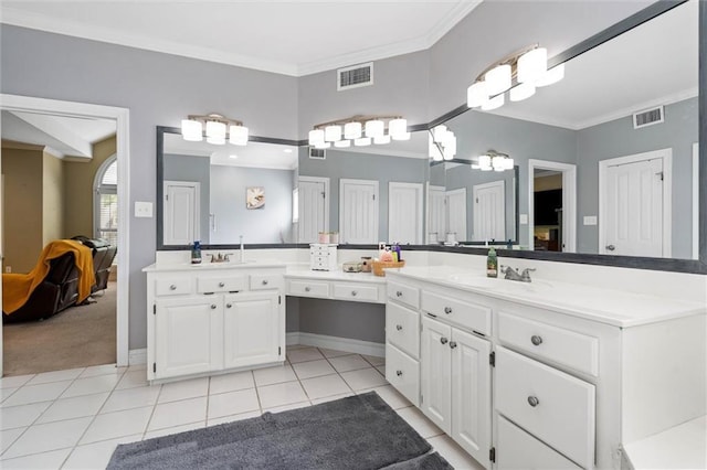 704 Providence Estates Dr E, Mobile, AL 36695 - bathroom with crown molding, tile patterned floors, vanity, ensuite bath, and baseboards