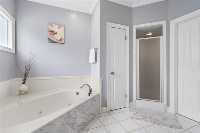 704 Providence Estates Dr E, Mobile, AL 36695 - full bath with a jetted tub, a shower stall, ornamental molding, tile patterned flooring, and baseboards