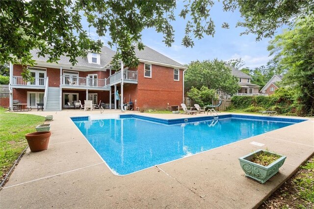 704 Providence Estates Dr E, Mobile, AL 36695 - view of pool with a patio, fence, and a diving board
