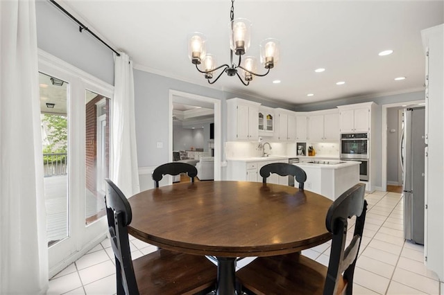 704 Providence Estates Dr E, Mobile, AL 36695 - dining area with light tile patterned floors, a chandelier, ornamental molding, and recessed lighting