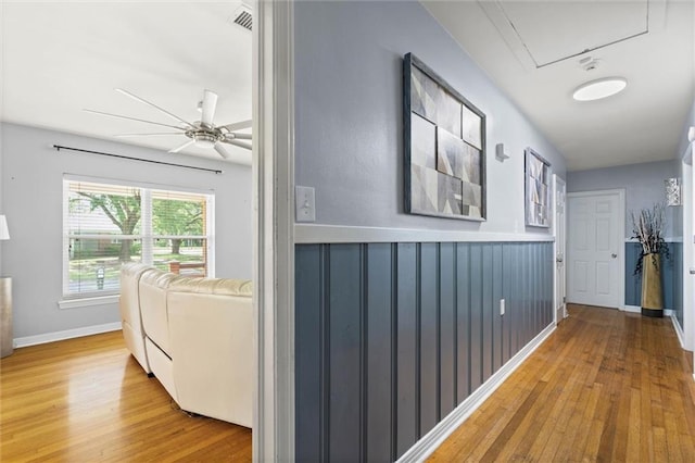 42 Lourando Dr W, Mobile, AL 36606 - corridor with wood finished floors, wainscoting, and attic access