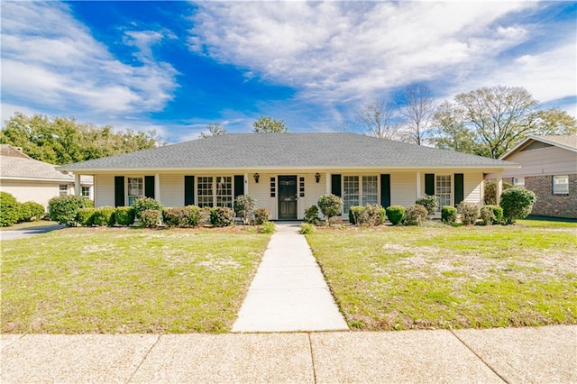 ranch-style home featuring a porch and a front yard