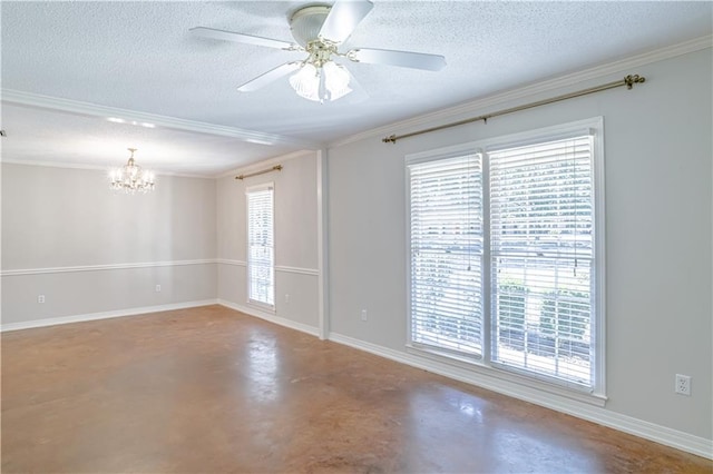 spare room featuring a textured ceiling, a healthy amount of sunlight, ceiling fan with notable chandelier, and concrete flooring