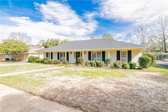 ranch-style house featuring a porch