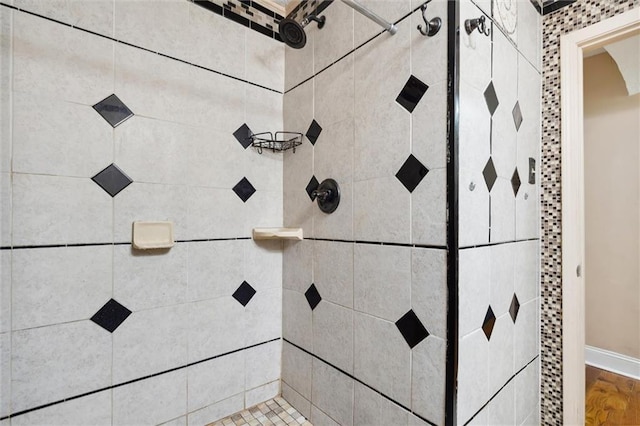 room details featuring a tile shower