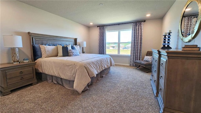 bedroom featuring light carpet, baseboards, a textured ceiling, and recessed lighting