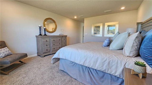 bedroom with carpet and recessed lighting
