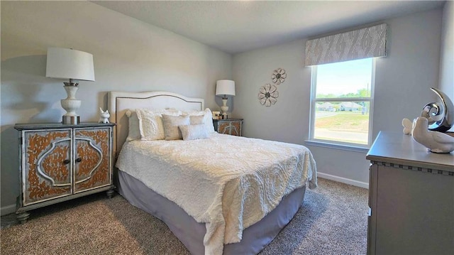 carpeted bedroom with baseboards