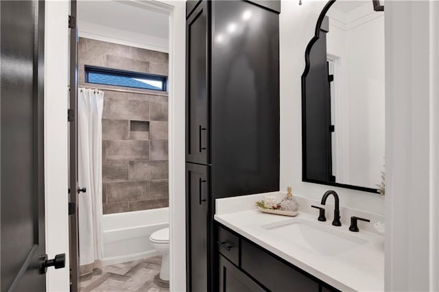 full bathroom with vanity, toilet, and shower / tub combo with curtain