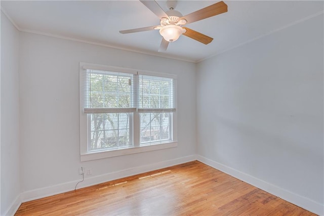 1852 Old Shell Rd, Mobile, AL 36607 - empty room featuring light wood finished floors, crown molding, and ceiling fan