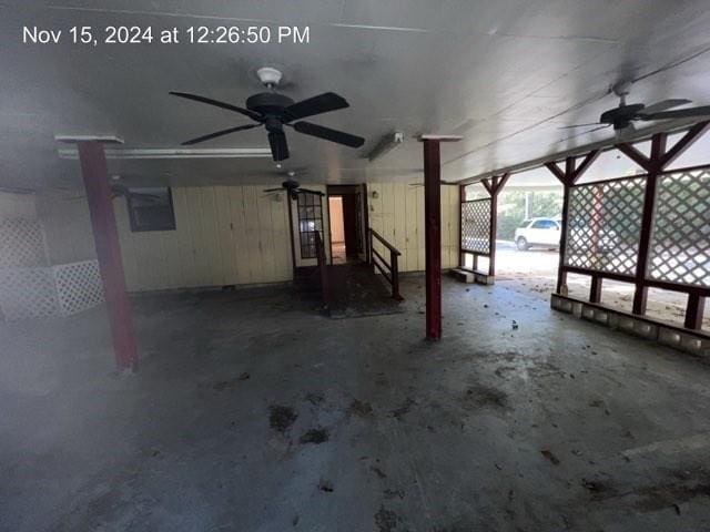 interior space featuring ceiling fan